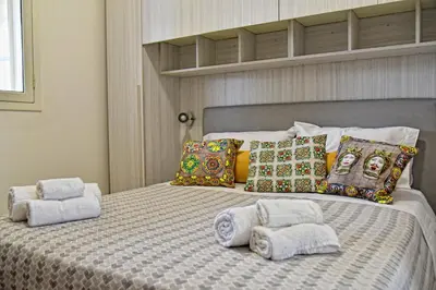 Letto o letti in una camera di La Gardenia
