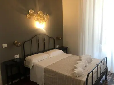 Letto o letti in una camera di Ursino's Luxury