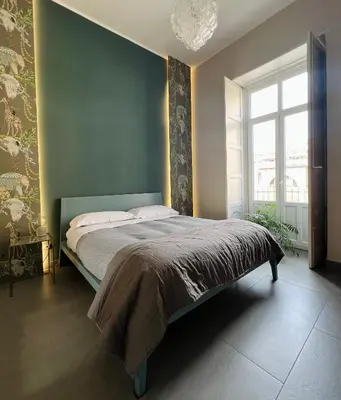 Letto o letti in una camera di Catania Rooms