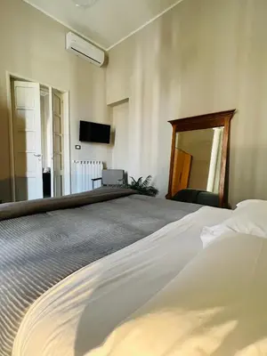 Letto o letti in una camera di Catania Rooms