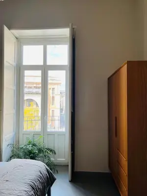 Letto o letti in una camera di Catania Rooms
