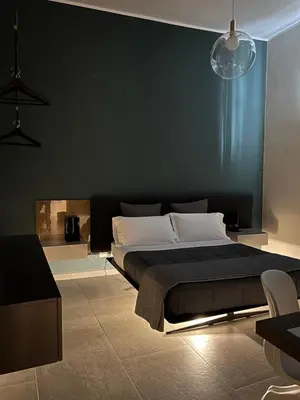 Letto o letti in una camera di Catania Rooms