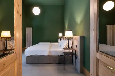 Letto o letti in una camera di CUELLA CASA- Ortigia Holidays