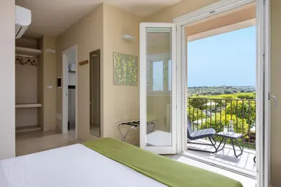 Letto o letti in una camera di Fiore di Vendicari B&B - Sicilian Charme, Lemon Grove and Sea
