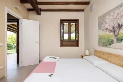 Letto o letti in una camera di Fiore di Vendicari B&B - Sicilian Charme, Lemon Grove and Sea