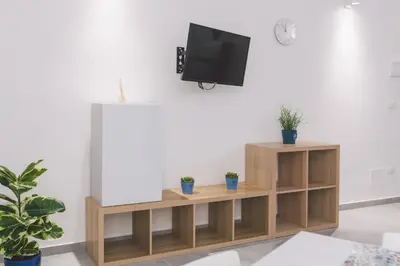 TV o dispositivi per l'intrattenimento presso Alagona Apartment