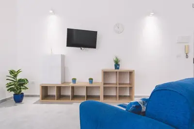 TV o dispositivi per l'intrattenimento presso Alagona Apartment