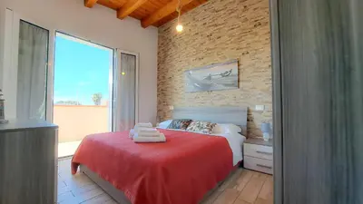 Letto o letti in una camera di Casa Veronica