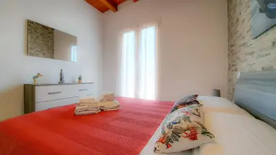 Letto o letti in una camera di Casa Veronica