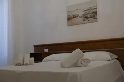 Letto o letti in una camera di Dimora Savarino Marzamemi Suites with pool