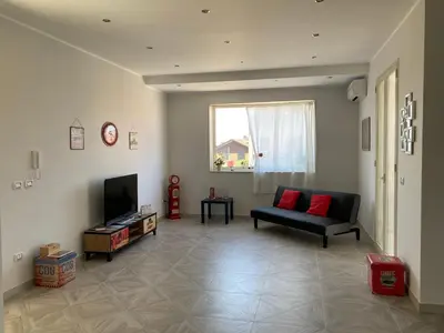 TV o dispositivi per l'intrattenimento presso Apartment 1st floor in Villino Eliana