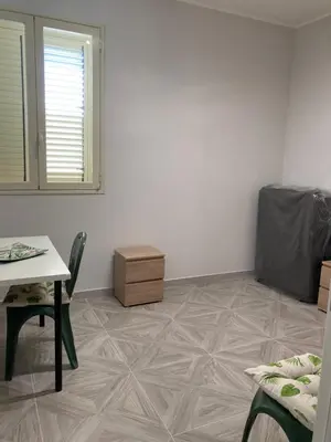 Area soggiorno di Apartment 1st floor in Villino Eliana