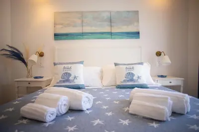 Letto o letti in una camera di Azzurro Mare Rooms
