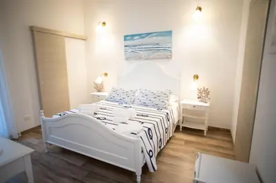 Letto o letti in una camera di Azzurro Mare Rooms