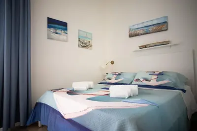 Letto o letti in una camera di Azzurro Mare Rooms