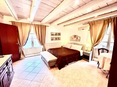 Letto o letti in una camera di Ortigia Suite San Giuseppe
