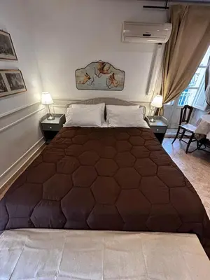 Letto o letti in una camera di Ortigia Suite San Giuseppe