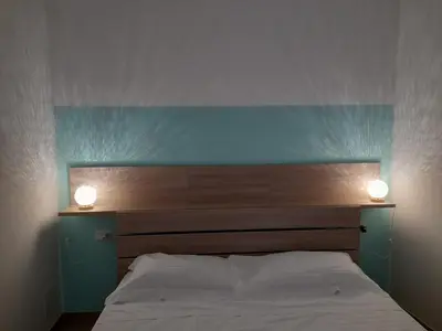Letto o letti in una camera di Ortigia spartan house 3