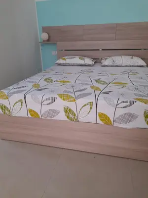Letto o letti in una camera di Ortigia spartan house 3