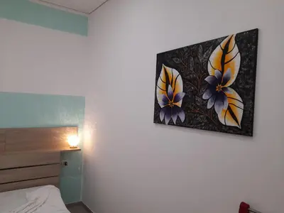 Letto o letti in una camera di Ortigia spartan house 3