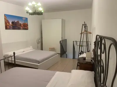 Letto o letti in una camera di Garibaldi 94- Intera casa a 2 passi dal Duomo
