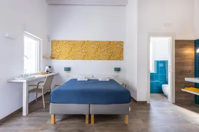 Letto o letti in una camera di I Gelsomini Guest House