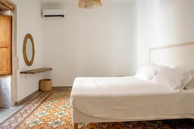 Letto o letti in una camera di La terrazza sul vicolo della Giudecca by Wonderful Italy