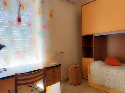 Letto o letti in una camera di Casa Sicilia
