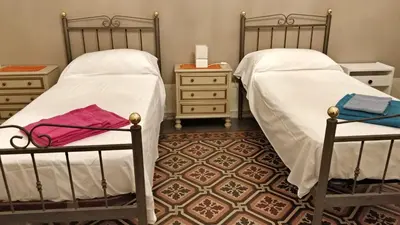 Letto o letti in una camera di Adriano's House Catania Cathedral First floor