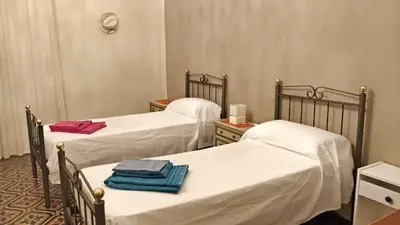 Letto o letti in una camera di Adriano's House Catania Cathedral First floor