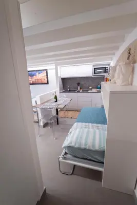 Letto o letti in una camera di Ortigia Charme piazza Duomo