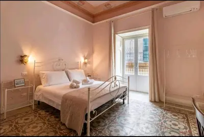 Letto o letti in una camera di A Casa ra Signurina