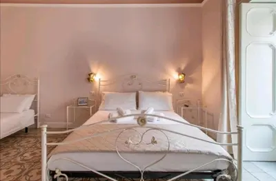 Letto o letti in una camera di A Casa ra Signurina