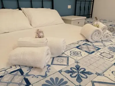 Letto o letti in una camera di A Casa ra Signurina