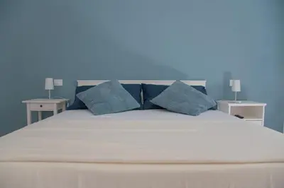 Letto o letti in una camera di Casa Thuja