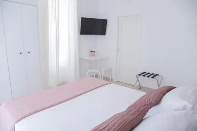 Letto o letti in una camera di Casa Thuja