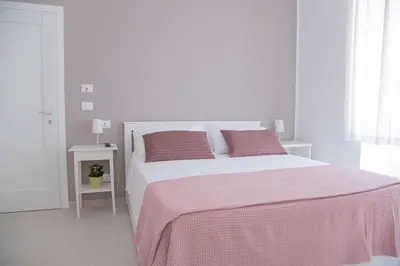 Letto o letti in una camera di Casa Thuja