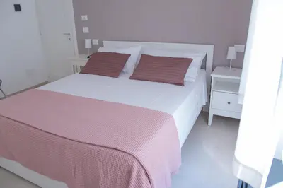 Letto o letti in una camera di Casa Thuja