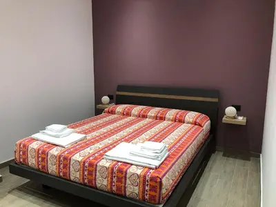 Letto o letti in una camera di Dimore Albrunè