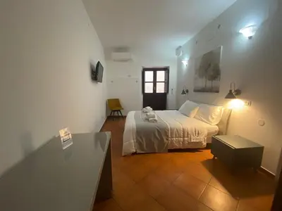 Letto o letti in una camera di Corte Roma 148 Apt