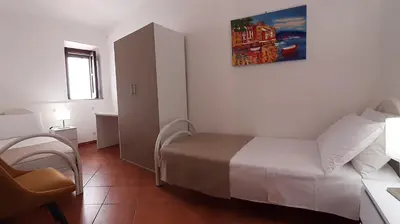 Letto o letti in una camera di Corte Roma 148 Apt