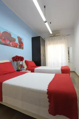 Letto o letti in una camera di B&B Mare di Augusta La Finestra sul Porto