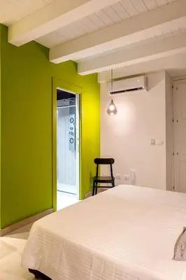 Letto o letti in una camera di ORTIGIAdreamrooms 12