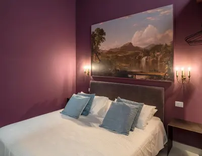 Letto o letti in una camera di ORTIGIAdreamrooms 14