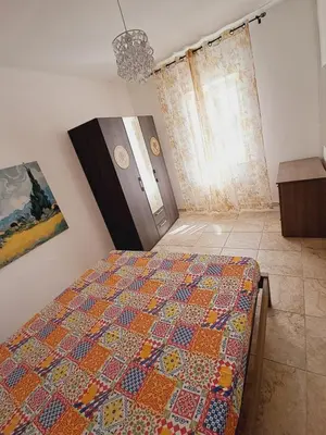 Letto o letti in una camera di HIBISCUS SIRACUSA