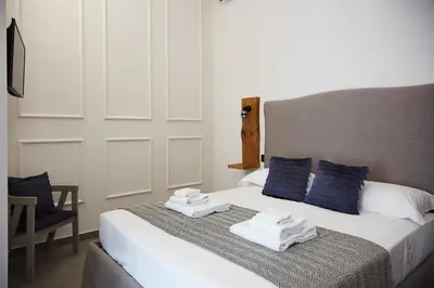 Letto o letti in una camera di Dimora Terranova Charming Rooms