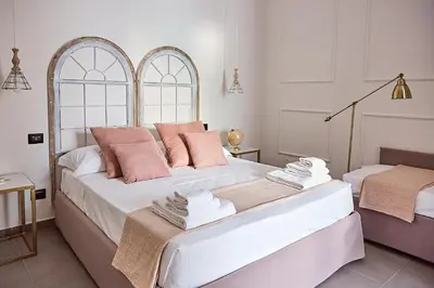 Letto o letti in una camera di Dimora Terranova Charming Rooms