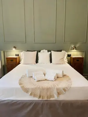 Letto o letti in una camera di Dimora Terranova Charming Rooms