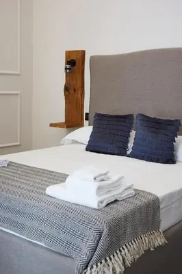 Letto o letti in una camera di Dimora Terranova Charming Rooms