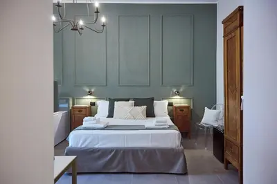 Letto o letti in una camera di Dimora Terranova Charming Rooms